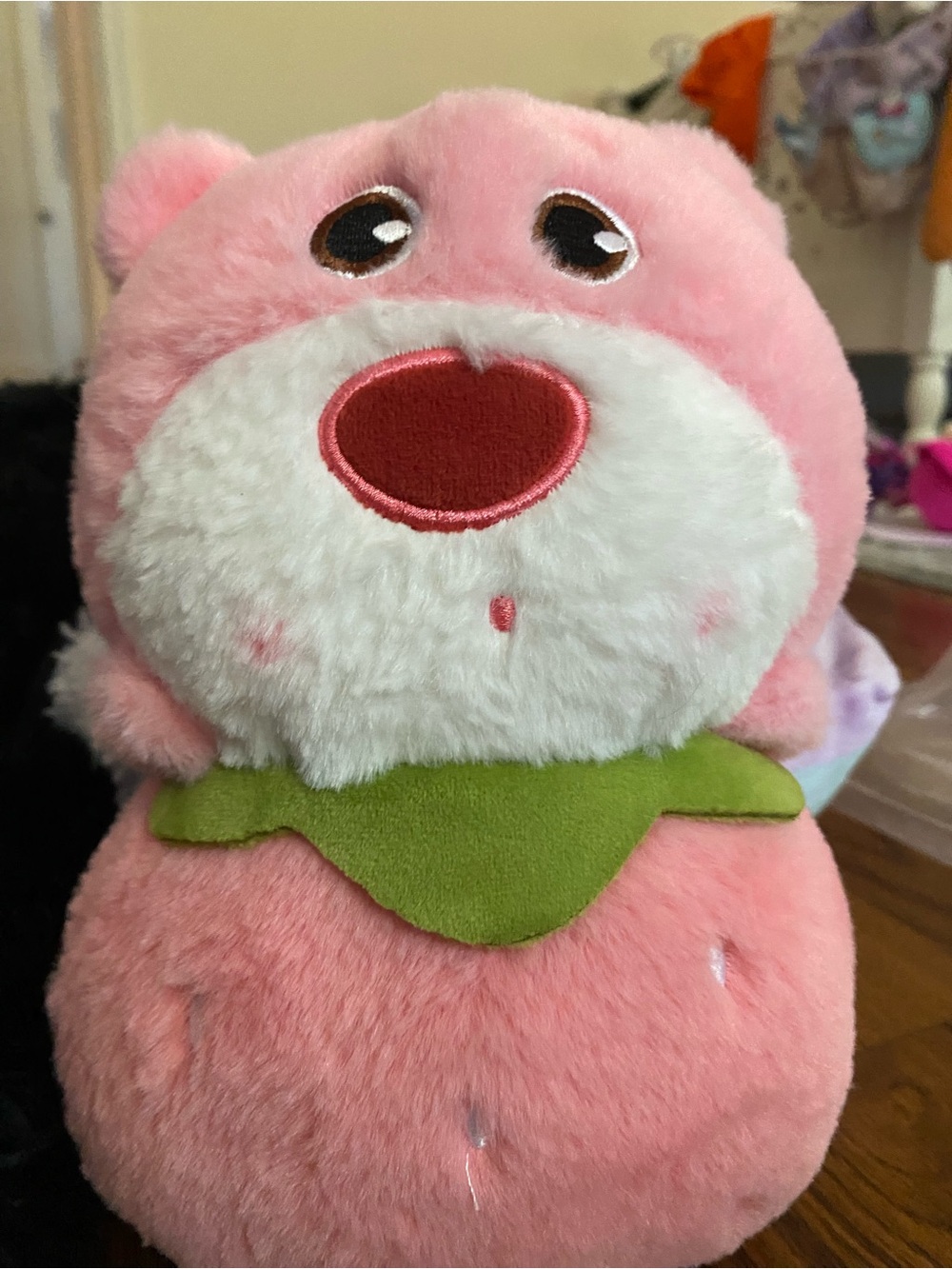 Strawberry bear- 
Pink Plush Bear with Green Collar